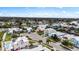 Stunning aerial view showcasing the neighborhood, canal and beautiful waterfront community at 6404 Key Island Ave, Apollo Beach, FL 33572