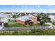 Charming single-Gathering home with lush green lawn and white picket fence at 6404 Key Island Ave, Apollo Beach, FL 33572