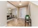 Inviting foyer featuring tile flooring, a decorative console table, and views into the adjacent dining area at 6404 Key Island Ave, Apollo Beach, FL 33572