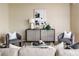 Chic living room featuring stylish decor and a sophisticated vibe, with plush seating and elegant accents at 6404 Key Island Ave, Apollo Beach, FL 33572