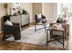 Modern living room showcases stylish decor and neutral tones with plush seating, perfect for relaxation and entertaining at 6404 Key Island Ave, Apollo Beach, FL 33572