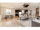 Open-concept living room and dining area offering plenty of natural light, creating a welcoming and comfortable atmosphere at 6404 Key Island Ave, Apollo Beach, FL 33572
