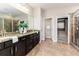 Main bathroom featuring double vanity, granite countertops, and walk-in shower at 6404 Key Island Ave, Apollo Beach, FL 33572