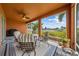 Enjoy the outdoors on this cozy patio with nice tile flooring, ceiling fan, and beautiful water views at 6404 Key Island Ave, Apollo Beach, FL 33572