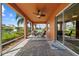 This spacious patio offers a ceiling fan, nice tile flooring and beautiful views to sit and enjoy the outdoors at 6404 Key Island Ave, Apollo Beach, FL 33572