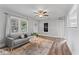 Light-filled living room featuring hardwood floors and a cozy seating area at 4110 1St N Ave, St Petersburg, FL 33713