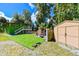 Backyard oasis with artificial turf, outdoor bar, and shed at 4617 John Moore Rd, Brandon, FL 33511