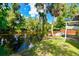 Relaxing waterfront view with private dock and lush greenery at 4617 John Moore Rd, Brandon, FL 33511