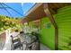Outdoor patio with dining table and chairs, offering a relaxing space at 4617 John Moore Rd, Brandon, FL 33511