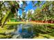 Charming home with a private pond and lush landscaping at 4617 John Moore Rd, Brandon, FL 33511