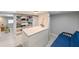 Bright basement with built-in storage, a pull-out couch, and a small table at 4617 John Moore Rd, Brandon, FL 33511