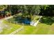 Private pond with a fountain and a walkway at 4617 John Moore Rd, Brandon, FL 33511