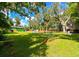 Large backyard with lush landscaping and garden at 4617 John Moore Rd, Brandon, FL 33511