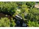 Aerial view highlighting the home's waterfront access and dock at 4617 John Moore Rd, Brandon, FL 33511