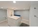 Finished basement features ample storage, a comfortable sitting area, and built-in shelving at 4617 John Moore Rd, Brandon, FL 33511
