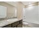 Bathroom with shower/tub combo and granite vanity at 6633 Serenity Fall Ln, Sarasota, FL 34240