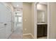 Small bathroom with granite vanity and shower at 6633 Serenity Fall Ln, Sarasota, FL 34240