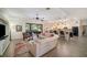 Spacious living room with sectional sofa and access to backyard at 824 Citrus Wood Ln, Valrico, FL 33594