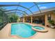 Spacious screened pool and spa with covered patio at 824 Citrus Wood Ln, Valrico, FL 33594