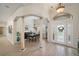 Elegant dining room with hardwood floors and columns at 824 Citrus Wood Ln, Valrico, FL 33594
