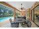 Inviting pool area with patio furniture and screened enclosure at 824 Citrus Wood Ln, Valrico, FL 33594