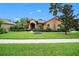 Beautiful home exterior with landscaping and curb appeal at 824 Citrus Wood Ln, Valrico, FL 33594