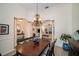 Spacious dining room with a view into the living room and kitchen at 824 Citrus Wood Ln, Valrico, FL 33594