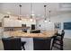Modern kitchen with granite countertops and stainless steel appliances at 824 Citrus Wood Ln, Valrico, FL 33594