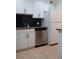 Kitchen with stainless steel dishwasher and granite countertops at 4606 W Gray St # 110, Tampa, FL 33609