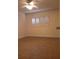 Bedroom with tile floors, ceiling fan and window shutters at 4606 W Gray St # 110, Tampa, FL 33609