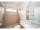 Simple bathroom with shower and granite countertop at 1704 Cresswell Manor Ct, Dover, FL 33527