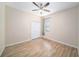 Bedroom with ceiling fan and double door closet at 1704 Cresswell Manor Ct, Dover, FL 33527