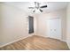 Bedroom with ceiling fan, window, and double door closet at 1704 Cresswell Manor Ct, Dover, FL 33527