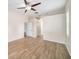 Spacious bedroom with hardwood floors and ample closet space at 1704 Cresswell Manor Ct, Dover, FL 33527