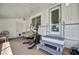Covered patio with steps and space for a small couch at 122 E Saint Annes Cir, Apollo Beach, FL 33572
