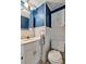 Clean and functional bathroom with white vanity and toilet at 122 E Saint Annes Cir, Apollo Beach, FL 33572