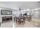 Dining area with a glass table and chairs, open to kitchen with a breakfast bar at 1819 Shore S Dr # 318, South Pasadena, FL 33707
