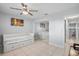 Guest bedroom with mirrored closet doors at 1819 Shore S Dr # 318, South Pasadena, FL 33707