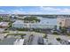 Aerial view of waterfront community building and parking at 1819 Shore S Dr # 318, South Pasadena, FL 33707