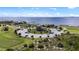 Park with playground and parking area near waterfront at 6404 Key Island Ave, Apollo Beach, FL 33572