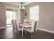 Dining area with table and chairs near sliding door at 5776 Newberry Pines Ave, Wesley Chapel, FL 33545
