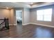 Large bonus room with a view into a bedroom and large window at 5776 Newberry Pines Ave, Wesley Chapel, FL 33545
