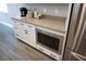Kitchen features a built-in microwave and grey countertops at 5776 Newberry Pines Ave, Wesley Chapel, FL 33545
