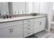 Double vanity bathroom with granite countertops and modern fixtures at 5776 Newberry Pines Ave, Wesley Chapel, FL 33545