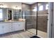 Modern bathroom with double vanity and large shower at 5776 Newberry Pines Ave, Wesley Chapel, FL 33545