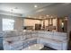 Open concept kitchen with large island and stainless steel appliances at 5776 Newberry Pines Ave, Wesley Chapel, FL 33545