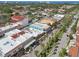 Aerial view of a quaint downtown area with palm trees lining the street at 608 Armada S Rd, Venice, FL 34285