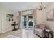 Bright sitting area with French doors opening to backyard at 608 Armada S Rd, Venice, FL 34285