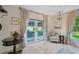 Relaxing sitting area with French doors leading to patio at 608 Armada S Rd, Venice, FL 34285