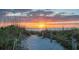 Scenic beach path at sunset; peaceful waterfront access at 608 Armada S Rd, Venice, FL 34285